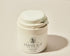 A white jar with a pump dispenser labeled Purabeauti Oxigeno Crema on a neutral background. anti-aging peptide acne safe moisturizer