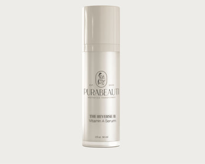 Vitamin A serum The Reverse II Skincare serum bottle labeled Purabeauti on a light gray background
